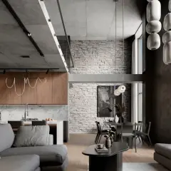 Nowoczesne mieszkanie w kamienicy: beton, cegła i drewno tworzą industrialne inspiracje. Sofa, jadalnia i kuchnia w otwartej przestrzeni.