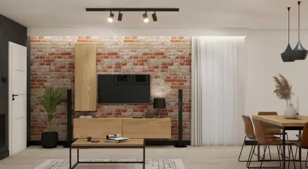 Nowoczesna aranżacja salonu w stylu loft z ceglaną ścianą, drewnianymi meblami i czarnymi dodatkami.